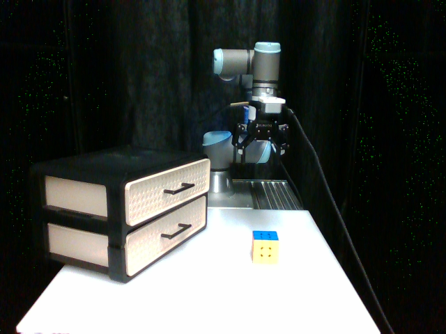 Task 2.4.1: open the drawer and place the Rubik's Cube inside